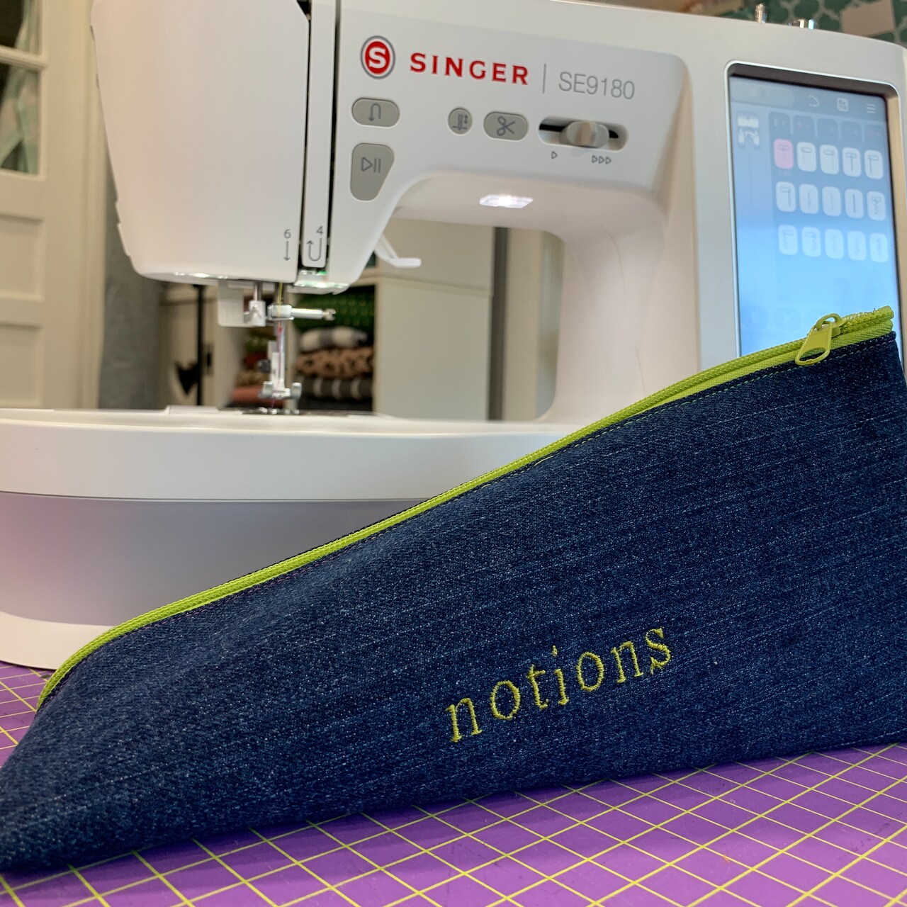 SINGER ® PROJECTS Triangle Embroidered Pouch